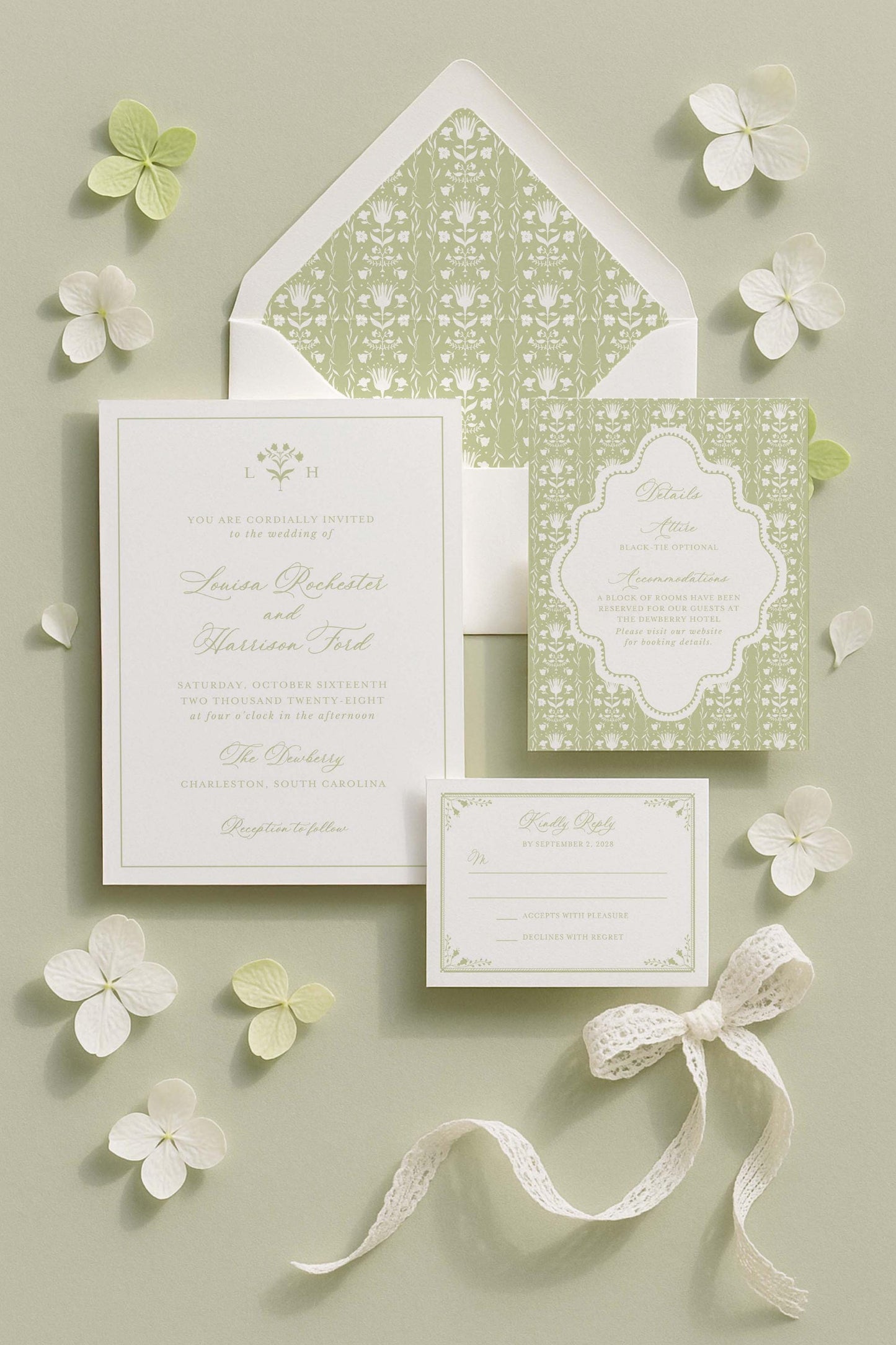 A formal wedding invitation featuring a white and green color scheme, with floral accents and a lace ribbon.