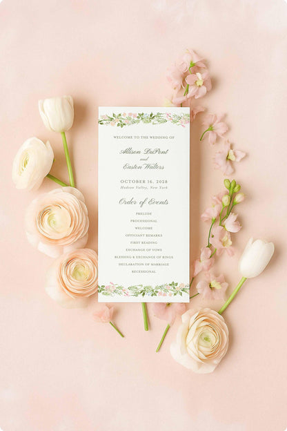 a wedding invitation card surrounded by pink roses and white tulips on a pink background.
