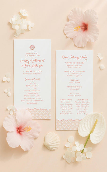 a wedding invitation card with a pink and white color scheme, surrounded by white flowers and seashells.
