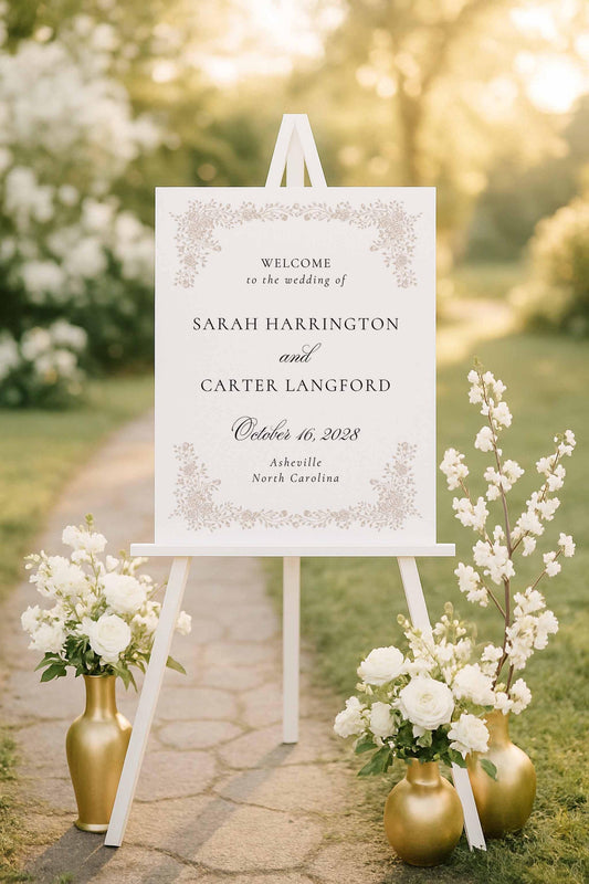 Large neutral wedding welcome sign with elegant hand drawn floral illustrations displayed on an easel.