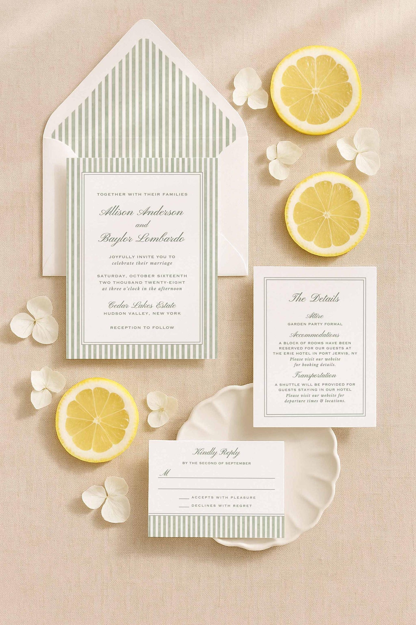 Green watercolor stripe wedding invitation suite including the main invite, detail card, envelope liner, and RSVP displayed with citrus and soft floral accents.