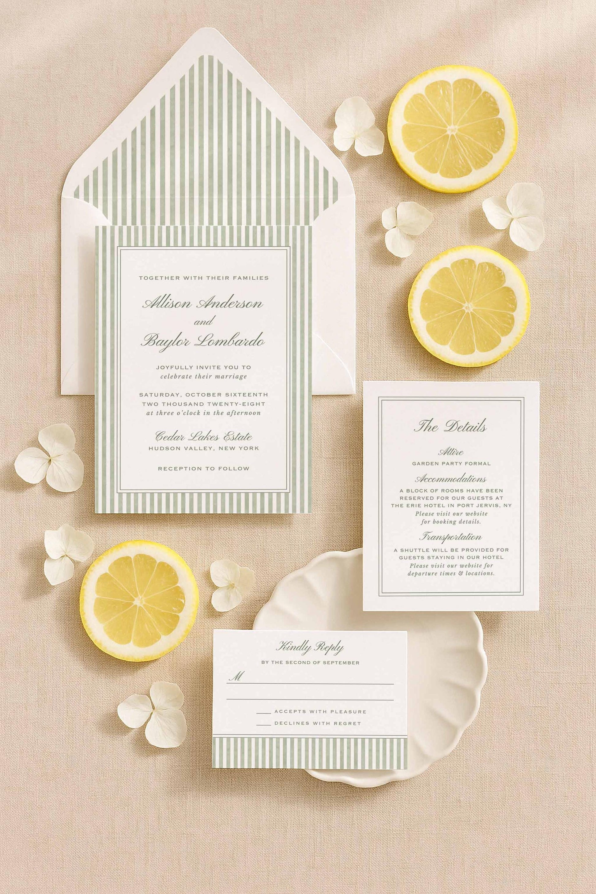 Green watercolor stripe wedding invitation suite including the main invite, detail card, envelope liner, and RSVP displayed with citrus and soft floral accents.