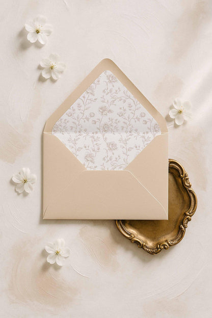 A7 envelope liner with delicate line-drawn floral illustrations in soft neutral tones.