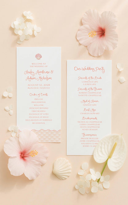 a wedding invitation card with a pink and white color scheme, surrounded by various flowers and shells on a peach background.