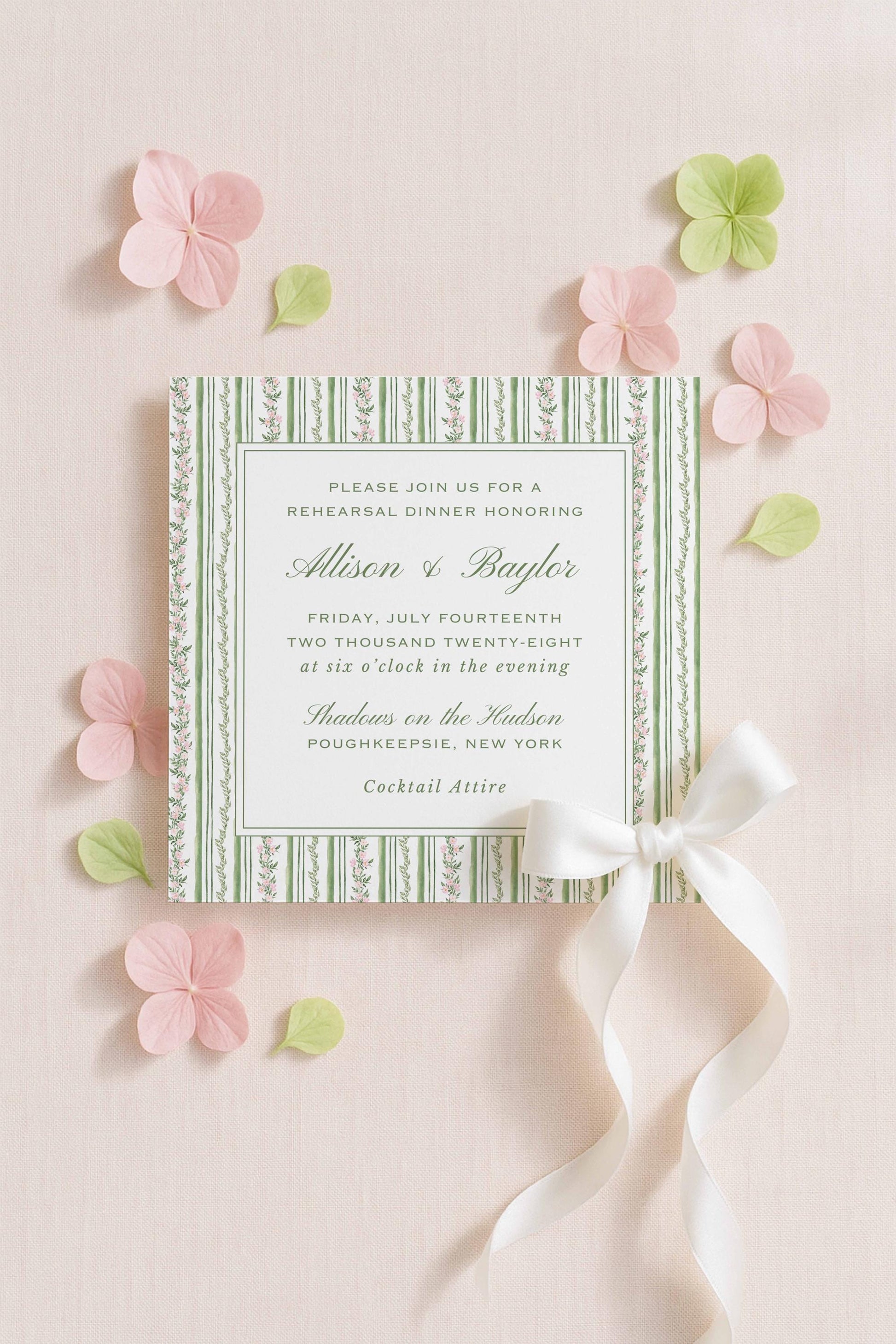 a formal invitation card with a green and white striped design, surrounded by pink and green flowers and leaves.