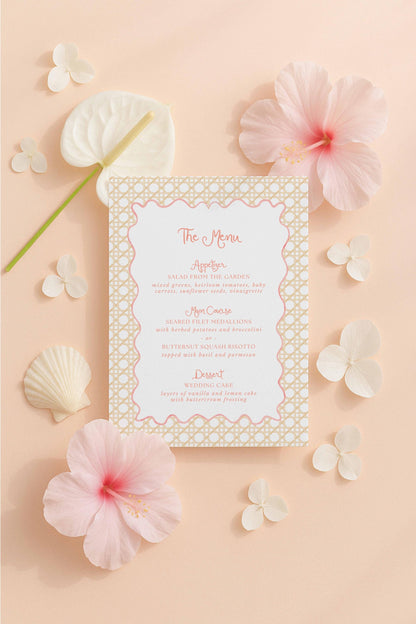 a menu card with a floral design, surrounded by various flowers and decorative elements on a peach-colored background.