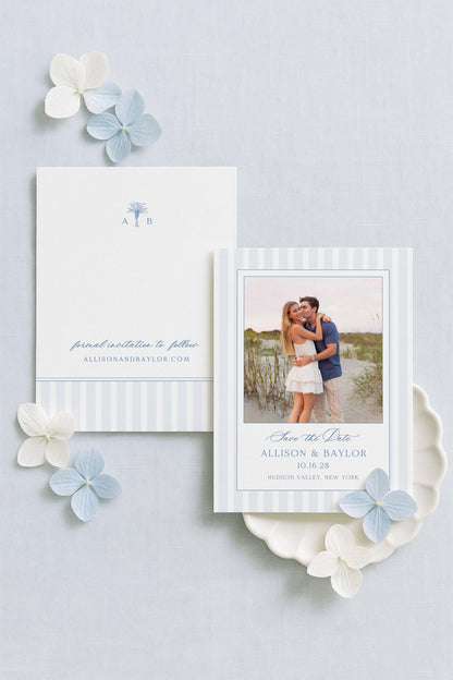 a couple embracing in a photograph, surrounded by a white card with text and a blue flower.