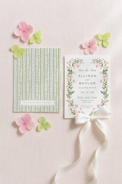 a wedding invitation with a floral design, a green and white striped card, and pink and green flowers on a light pink background.