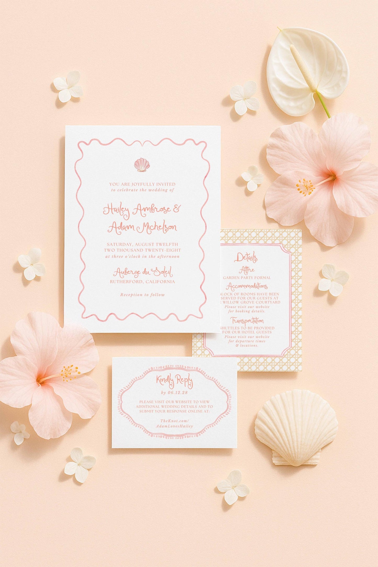 a wedding invitation with a pink and white color scheme, surrounded by various floral elements such as hibiscus flowers and seashells.