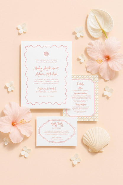 a wedding invitation with a pink and white color scheme, surrounded by various floral elements such as hibiscus flowers and seashells.