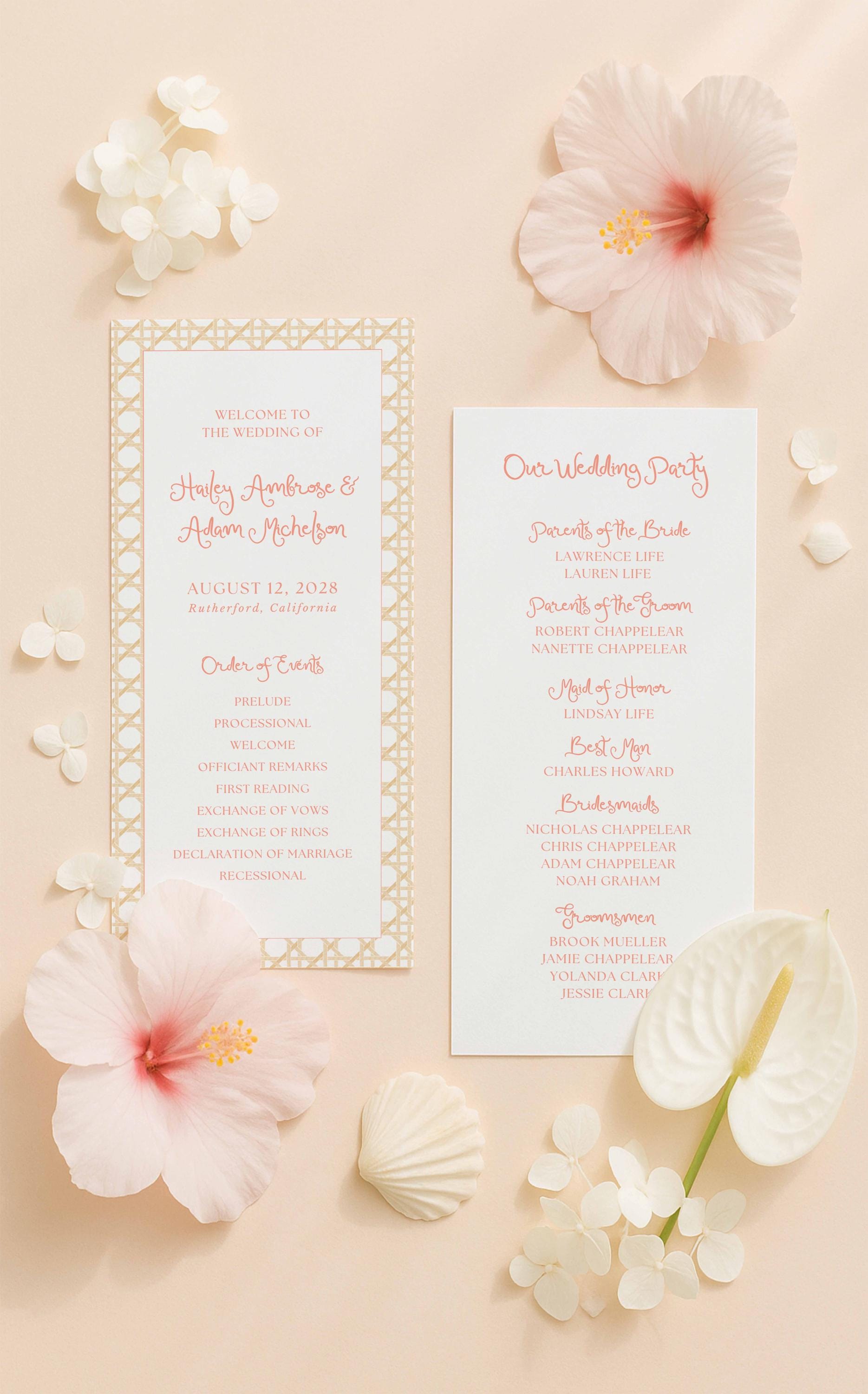 a wedding invitation with a pink and white color scheme, surrounded by flowers and shells on a peach background.
