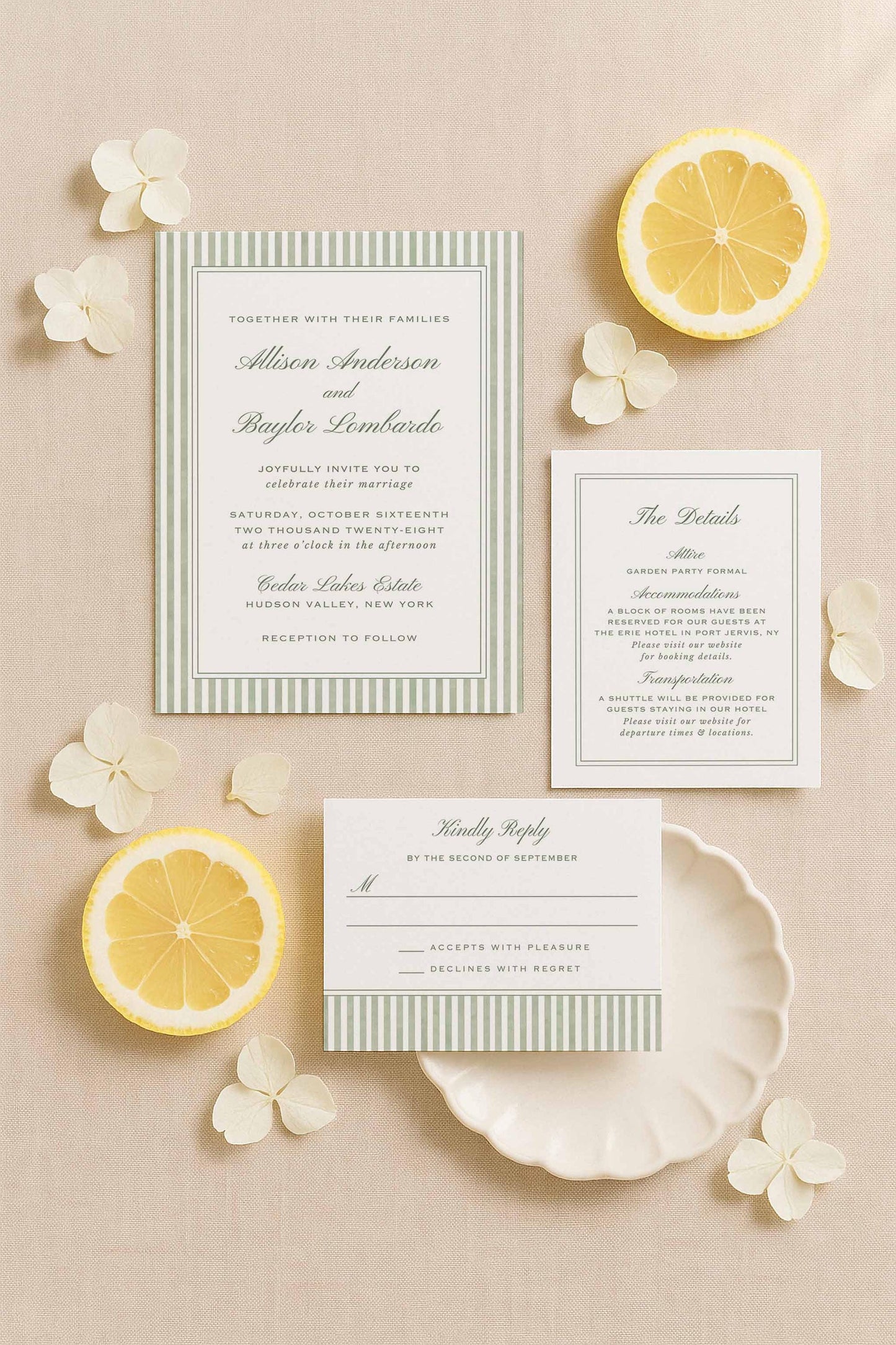 Green watercolor stripe wedding invitation suite including the main invite, detail card, and RSVP displayed with citrus and soft floral accents.