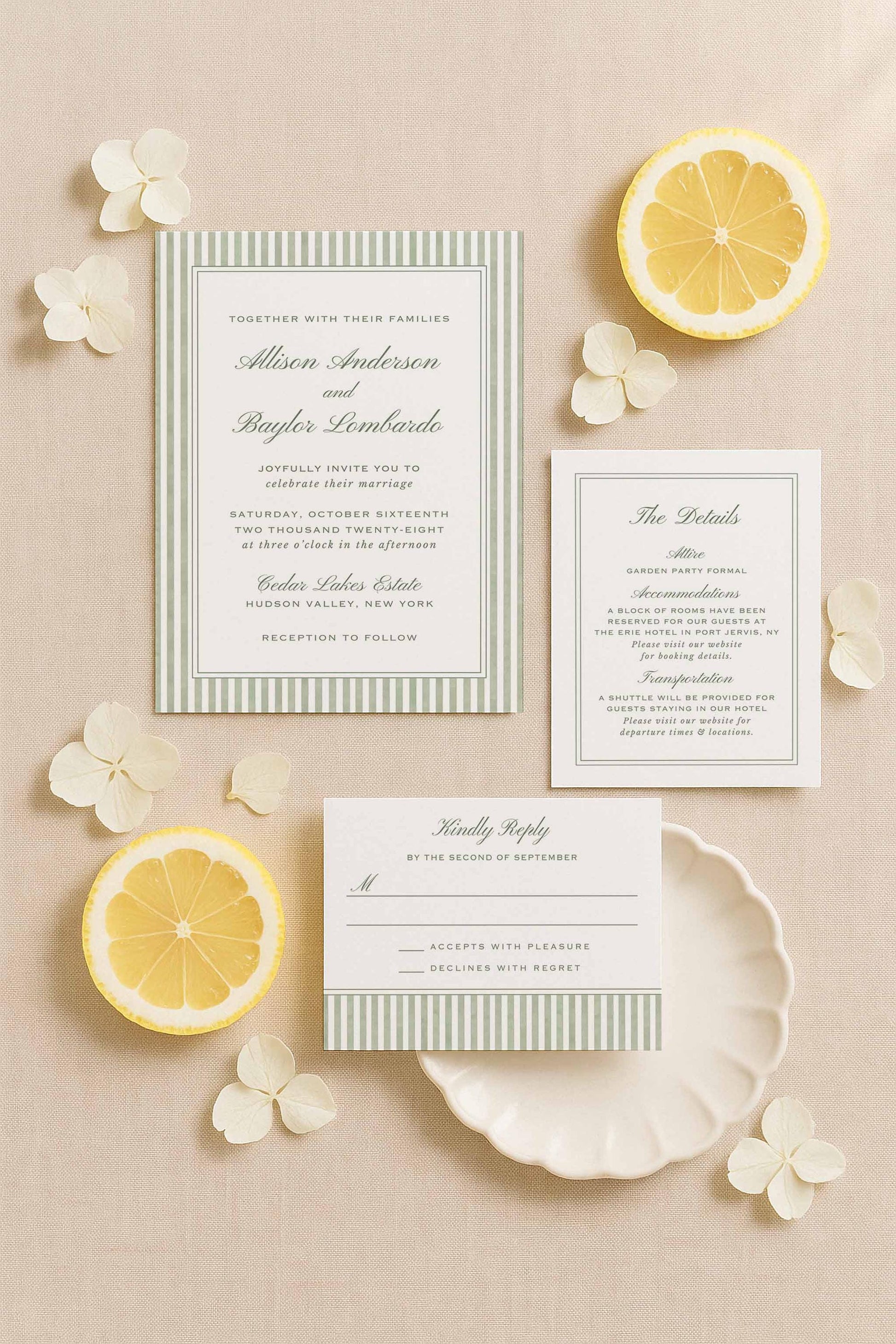 Green watercolor stripe wedding invitation suite including the main invite, detail card, and RSVP displayed with citrus and soft floral accents.