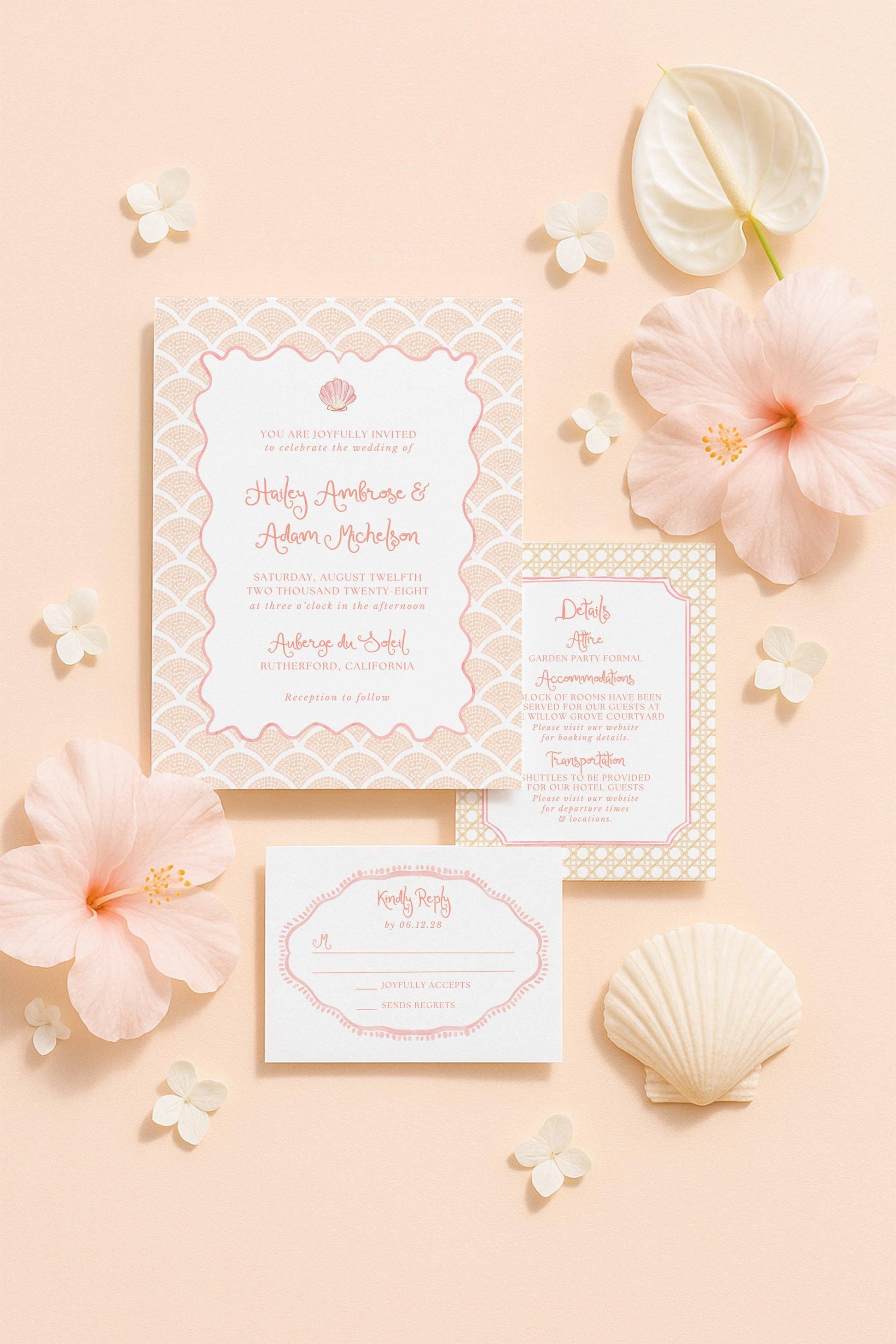 a wedding invitation with a pink and white color scheme, surrounded by various floral elements such as hibiscus flowers and seashells.